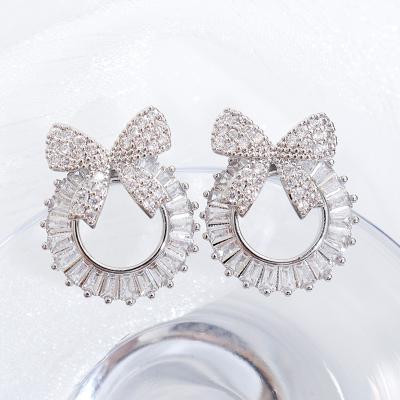 China TRENDY Korean Fashion Bow Knot Circle Cute Zircon Crystal Gold Plated Stud Earrings for Women Girls Jewelry Wedding Bridal Gift for sale