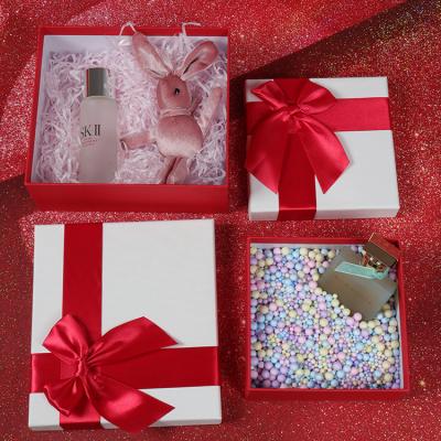 China Recycled Materials Custom Printed Folding Packaging Paper Number Grinding Portable Christmas Gift Box for sale