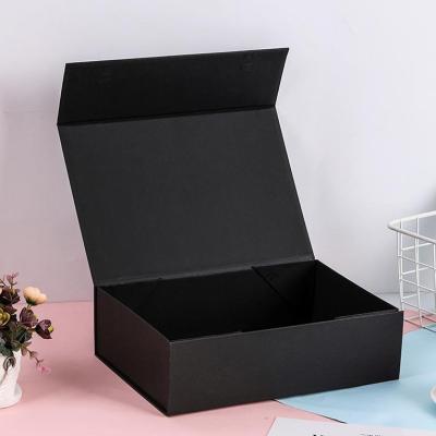 China Luxury Recyclable Custom Black Cardboard Magnetic Packaging Storage Lid Fancy Flap Paper Gift Box for sale