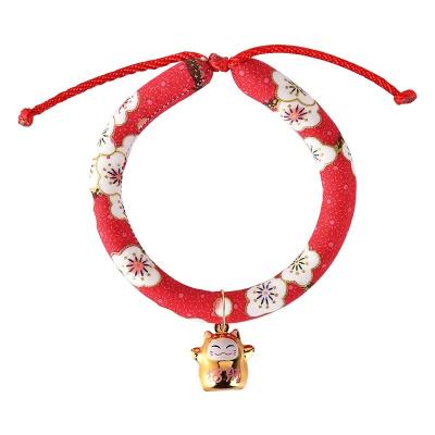 China Viable Collar Cat Dog Lovely Floral Adjustable Pet Collar With Bell for sale