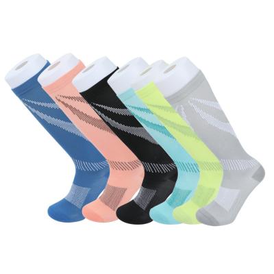 China Calf Color Patchwork Sports Socks Moisture Absorption Tube Socks QUICK DRY Breathable Pure Color Over The Knee Casual Socks for sale