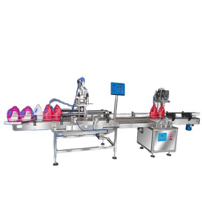 China Full Automatic Liquid Food Filling Machine All Self-flow Plastic Corrosive Filling Machine Bleach Water Toilet Cleaning Liquid Quantity for sale