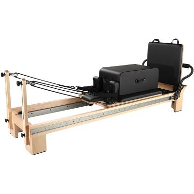 China 2022 Pilates Fitness Pilates Reformer Machine Pilates Fitness Machine Maple Wood Professional Solid Yoga Training for sale