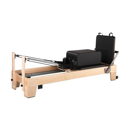 China Portable Fitness Wooden Exercise Pilates Reformer Factory Price Maple Wood Pilates Chair Reformer for sale