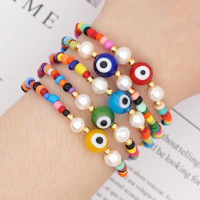 China FASHIONABLE Women Lucky Evil Bracelets Cute Eye Beads Jewelry Colorful Bohemian Stretch Beaded Bracelet for sale