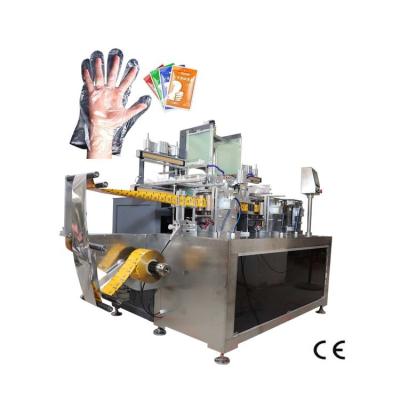 中国 70PCS / Min Four Side Seal Packing Machine Disposable PE Glove 2 In 1 Packaging Machine 販売のため