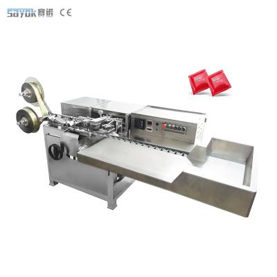 China Multi-Row High Production Automatic Lubricant Condom Packing Machine for sale