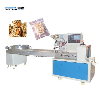 China Servo Control de alta velocidad de nueces cuadradas crujiente máquina de embalaje de almohada de alimentación automática en venta