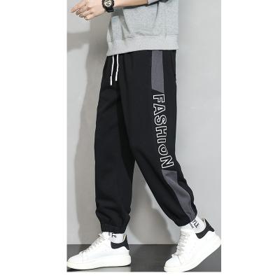 China Custom Flat Mens Tracksuit Pants Foot Casual Street Cut Running Sweatpants for sale