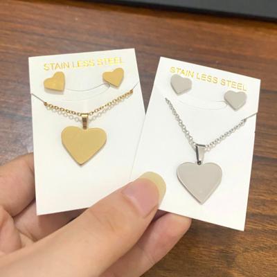 China Gold Heart Shaped Earrings Love Necklace Vintage Fashion Stainless Steel Jewelry Set For Women for sale