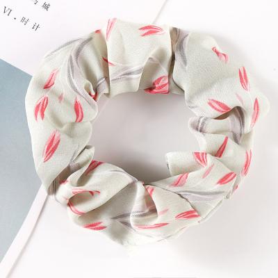 China Daily wear the latest fashion design hair ring petal fabric unique cute animated elastic hair tie for sale