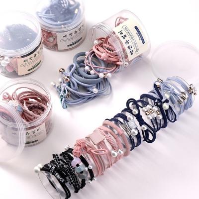 China Durable Korean Single Head Pearl Blue Pink Flower Rope Headwear Wild Female Hair Rope for sale