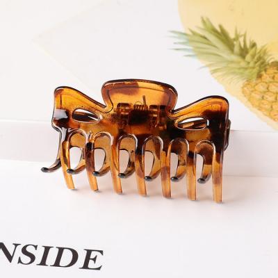 China Fashion Hot-selling all-matchgeometric hair accessories big hairpin leopard print claw clip ponytail claw clip for sale