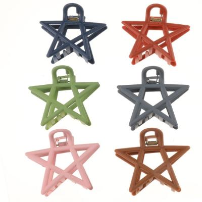 China New Big Sale Modern 7.5cm Hair Claw Clip All-match Hair Accessories Hollow Out Five-pointed Star Resin Hair Claw for sale