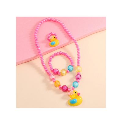 China Children Cute 3 Piece New Cute Jewelry Set Cartoon Beaded Duck Necklace Wholesale Stretch Bracelet Yellow Duck Ring for sale