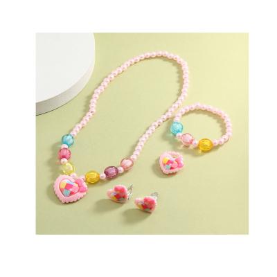 China New 5 Pieces Cartoon Beaded Bracelet Cute Children's Bead Jewelry Girl Love Pendant Cute Ring Necklace Ear Clip Set for sale