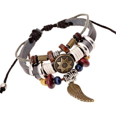 China Punk Adjustable Angel Wings Bracelet Vintage Leather Braided Charm Couples Beaded Multilayer Jewelry Bracelet for sale