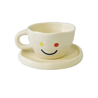 China Viable Manufacturer Well Made New Smile Face Mugs With Saucer Coffee Milk Ceramic Cups Set for sale