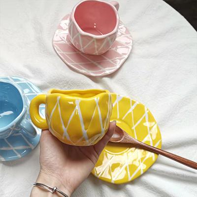 China Sustainable Handmade Rhombus Coffee Cup And Saucer Set Round Cute Simple Ceramic Yellow Blue Yellow Irregular Drinking Dish for sale