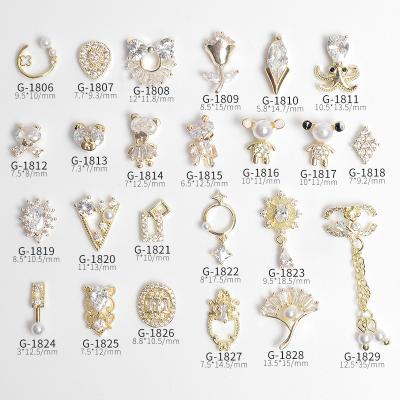 China New Zircon Nail Art Zircon Pendant Real Gold Color Retention Plated Nail Charm Nail Accessories for sale