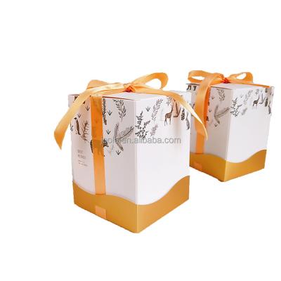 China Recyclable Biscuit Cookie Packaging Box With Gold Satin Ribbon Bowknot Clamp Christmas Elements Packaging Box for sale