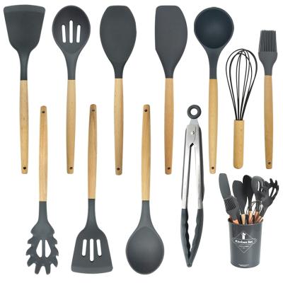 China Stocked Reusable Non-Stick Silicone 12pcs Kitchen Utensils Cooking Sets With Wooden Handles for sale