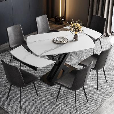 China Modern Household Tempered Glass Folding Around Solid Wood Dining Table And Dining Table Legs Chairs for sale