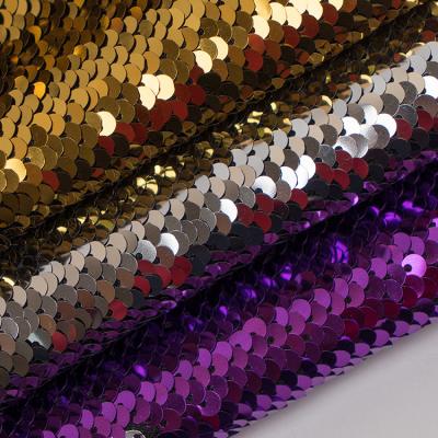 China Flame Retardant Hot Selling 100% African Polyester Purple Rose Gold Tulle Sequin Fabric for sale