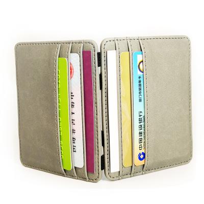 China Waterproof Customize High Quality Leather Push Up Magic Slot Card Ticket Wallets for sale