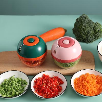 China Fantastic Mini Geared Ball Push Garlic Device Cleaver Chilli Pepper Crusher Geared Garlic Presses Garlic Crusher for sale