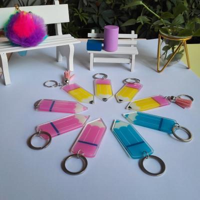 China Custom Wholesale Customized Plastic Teacher Graduation Gift Acrylic Pencil Blank withTassel Customized Key Chain for sale