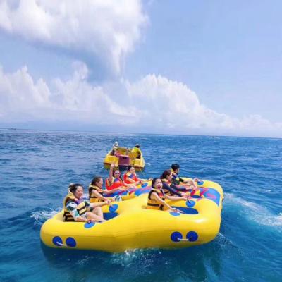 China Aqua Floating Towable Toys Inflatable Boat Donut Boat Ride Fly Tube Plato 0.9mm PVC 7 Person Skie Tube For Water Sport Games for sale