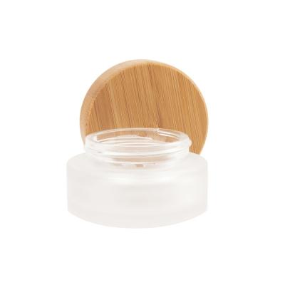 China Cosmetic Best Frosted Clear Cosmetic Packaging glass bamboo jar bamboo cosmetic glass jar for cosmetics for sale