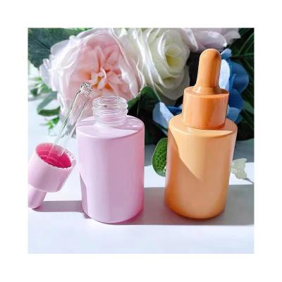 China Recyclable Different specifications Frosted colorful glass essential oil bottle 2ml essential oil roller bottle case for sale