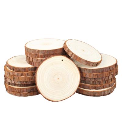 China USA 2.4-2.8 Inch Eco-Friendly Unfinished Natural Round Disc Pine Tree Log Tree Wood Slices For DIY Crafts for sale