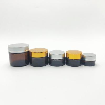 China Cosmetic Empty Cosmetic Cream Amber Glass Jar With PP Lid for sale