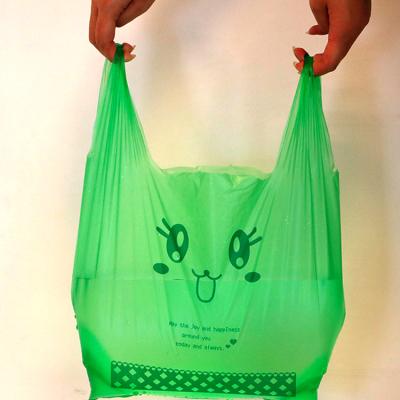 China Disposable Eco-friendly Biodegradable Plastic Shopping T-shirt Bag Goods Food Service Food Shopping Plastic Bags With Handles for sale