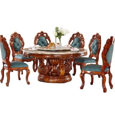 China Foldable European natural marble ebony wood wooden dining table and chair with rotating center baroque combination luxury dining room furniture for sale