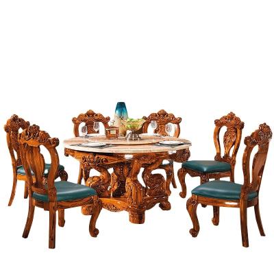 China Luxury high-end European-style round wooden marble ebony dining table foldable dining table and chair combination villa for sale