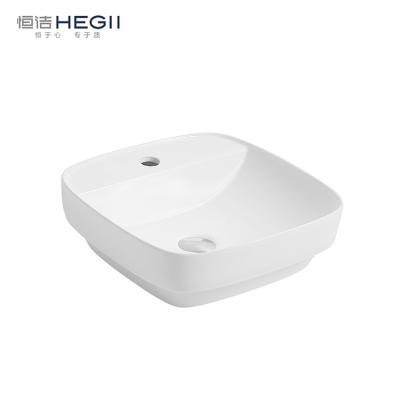 China Latest Design HEGII Ceramic Hand Basin Sink Home Modern Square Solid Surface Bathroom Toilet for Hotel for sale