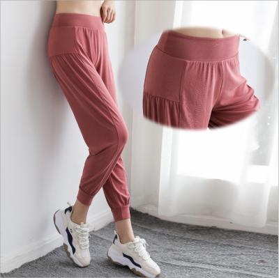 China Breathable High Waist Yoga Loose Leg Pants For Running And Sport Leggings for sale