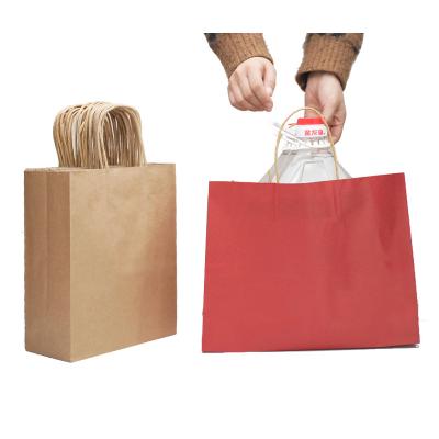 China Recyclable Recyclable Paper Packaging Printing Bags Kraft Paper Bag With Handle for sale