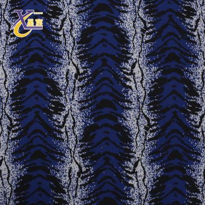 China Other Manufacturer Fashion Garment Customized Jacquard Poly Stretch Knitted Blue Leopard Fabric for sale