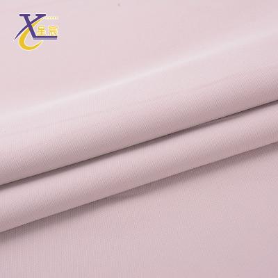 China Other New Arrival Wholesale Soft Stretch Woven Polyester Stock Garment Fabric for sale