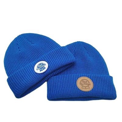 China JOINT Factory Custom Dyed Color Winter Knit Beanie Cap With Leather Embroidery Patch For Hats for sale