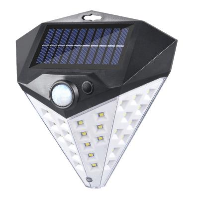 China Waterproof Lighting Solar Powered Wall Security Lamp Motion Sensor Garden Lights 36 LED Motion Activated Radio for sale