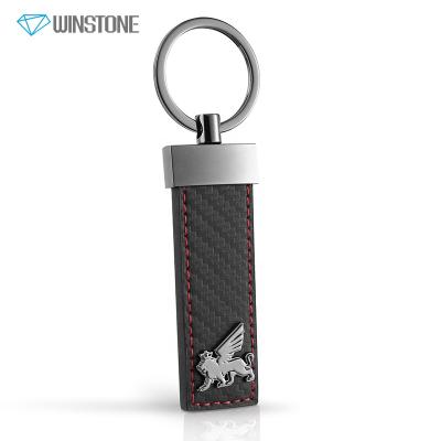 China Promotion Gift Grain Carbon Fiber Texture Leather Key Holder With Custom Die Cast Logo Emblem for sale