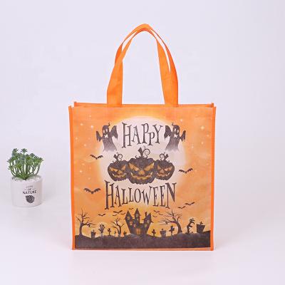 China OEM Handled All Over Printing Pumpkin Artwork Non Woven Polypropylene Bag For Halloween Days for sale