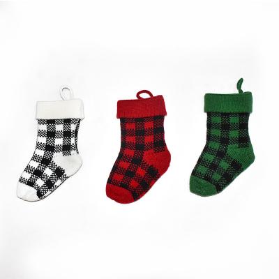 China Bases for Xmas Christmas Decorations 2021New Knitted Decorative Christmas Plaid Socks Small Size Stockings for sale