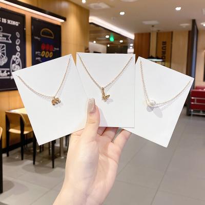 China Boho Trendy Multilayer Choker Chain Alloy Pearl Jewelry Huibang Pendant Necklace For Women for sale